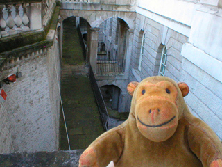 Mr Monkey looking down from the courtyard of Somerset House
