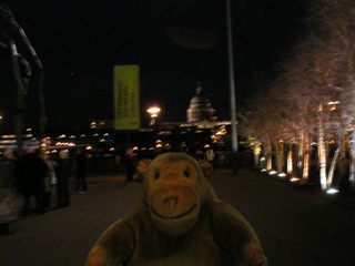 Mr Monkey looking across the Thames at dusk