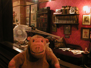 Mr Monkey looking into the study from a side window