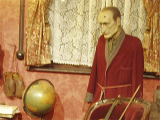 The model of Sherlock Holmes, as shot by Colonel Moran