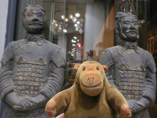 Mr Monkey with two replica terracotta warriors
