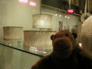 Mr Monkey looking at Irit Abba's carved cylinders