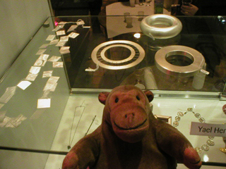 Mr Monkey looking at jewelery by Yael Herman