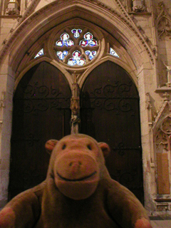 Mr Monkey looking at the west door of the Minster