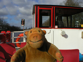 Mr Monkey on the top deck of the boat