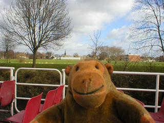 Mr Monkey looking at St Peter's School