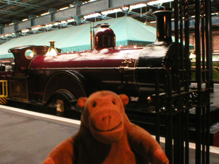 Mr Monkey looking at a Midland Railways class 115 4-2-2