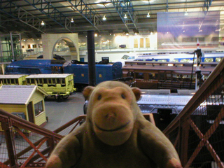 Mr Monkey looking towards the Great Hall entrance from the wooden bridge