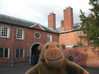 Mr Monkey looking at the service wing of the house