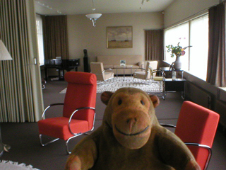 Mr Monkey looking at the sitting room from the library