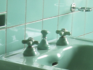 A washbasin in the main bathroom