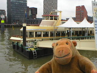 Mr Monkey looking at the pancake boat moored in the Parkhaven