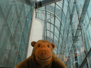 Mr Monkey peering over the railings  from level 3