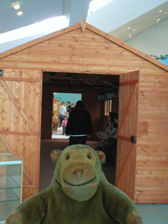 Mr Monkey looking back through the exit shed