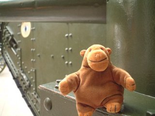 Mr Monkey on the left sponson of a Mark V tank