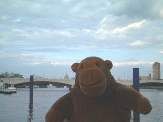 Mr Monkey with Waterloo Bridge behind him