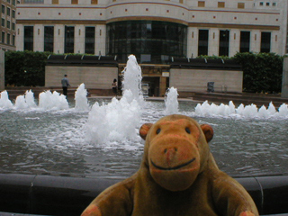 Mr Monkey looking at the fountain in Cabot Square