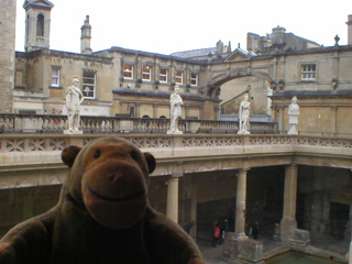 Mr Monkey looking at the statues around the terrace