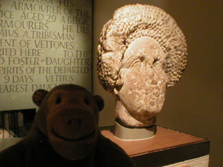 Mr Monkey looking at the head of a Roman lady of fashion