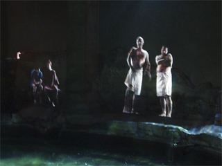 Bathers projected onto the wall of the west bath