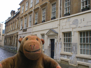 Mr Monkey looking down Old Orchard Street