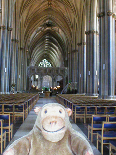 Mr Monkey looking down the nave of Bristol Cathedral