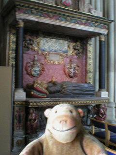Mr Monkey looking looking at the tomb of Dame Joan and Sir John Young
