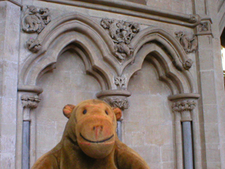 Mr Monkey looking at carvings in the Elder Lady Chapel