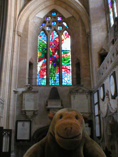 Mr Monkey looking at the window in the south choir aisle
