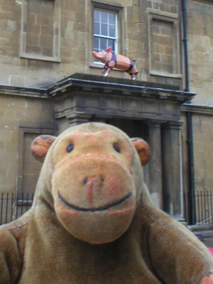 Mr Monkey looking up at Pig in Prada