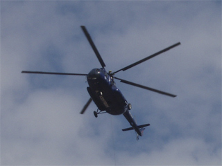 A helicopter flying over Prague