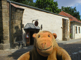 Mr Monkey looking at the remains of the Špička Gate