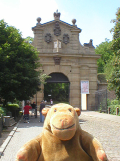 Mr Monkey looking at the outside of the Leopold Gate