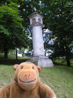 Mr Monkey looking at the plague pillar