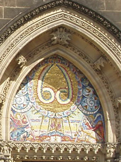 The mosaic above the side door of the church