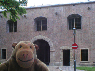 Mr Monkey looking at the inside of the Brick Gate at Vyšehrad