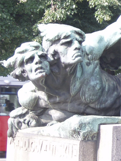 A two headed person at the base of the Palacky monument