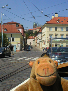 Mr Monkey looking up towards Prague castle