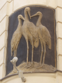 The Three Storks house sign