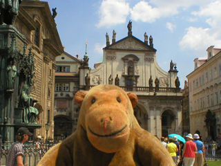 Mr Monkey looking at the Church of the Holy Saviour at the Klementinum