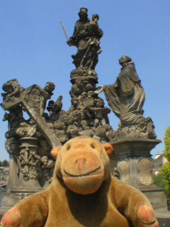Mr Monkey looking the 1709 statue of the Madonna and St Bernard