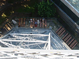 The view straight down from the terrace - people eating at picnic benches