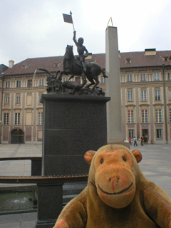 Mr Monkey looking at the statue of St George