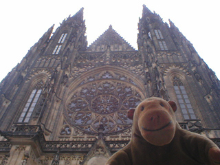 Mr Monkey looking up at the west facade of the Cathedral 