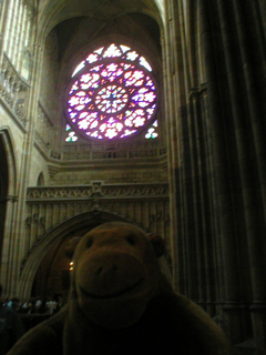 Mr Monkey looking at the rose window