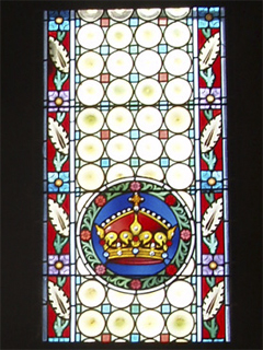 A stained glass window in the second floor chamber