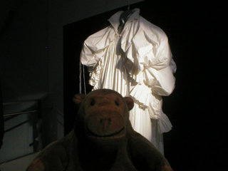 Mr Monkey looking at Nabil El Nayal's Six Sleeve Dress