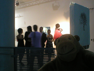 Mr Monkey watching the Award winners, Peter Saville and a photographer