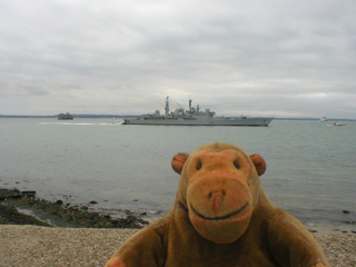 Mr Monkey looking at HMS Gloucester in the Solent