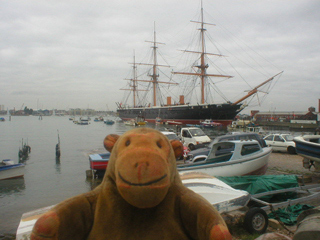 Mr Monkey looking at HMS Warrior